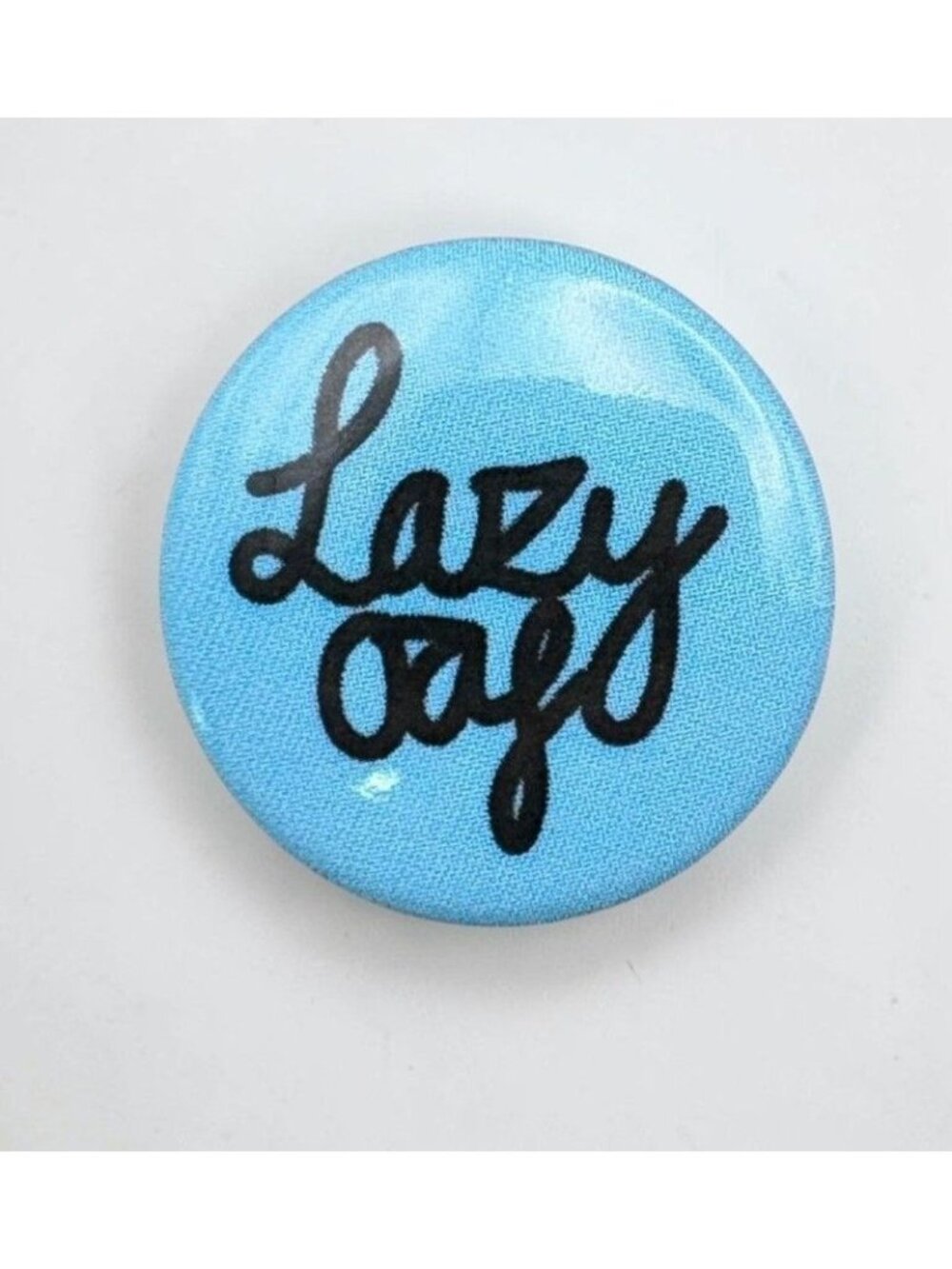 Lazy Oaf Jacket Button Pin Sky Blue with Black Script Text Retro Fashion